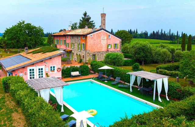Historical overlooking Lake Garda Villa with private park and swimming pool.