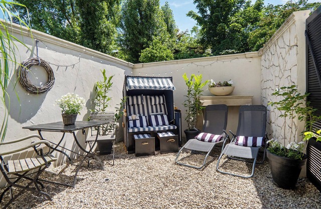 Holiday Apartment 'Gästewohnung Am See - Maisonette' with Private Terrace and Wi-Fi Near the Beach