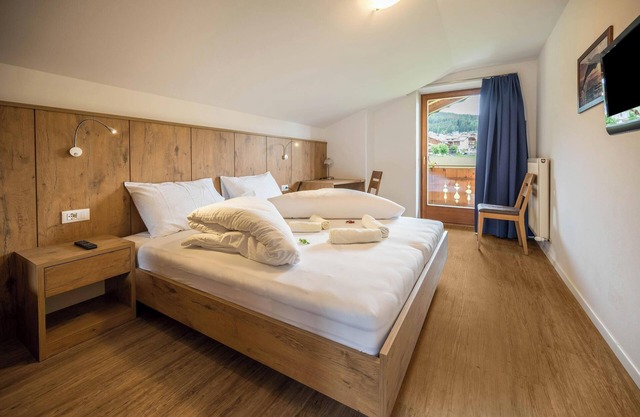 Holiday Apartment "Residenz Condor Schlern" with Mountain View, Sauna & Garden