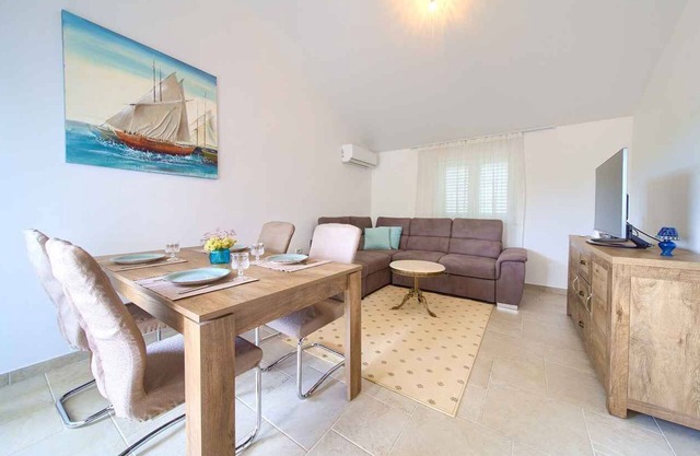 Holiday apartment with balcony and air conditioning