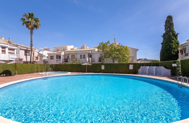 Holiday Home 'Casa en la playa con piscinas 11 A' with Shared Pool, Wi-Fi and Air Conditioning
