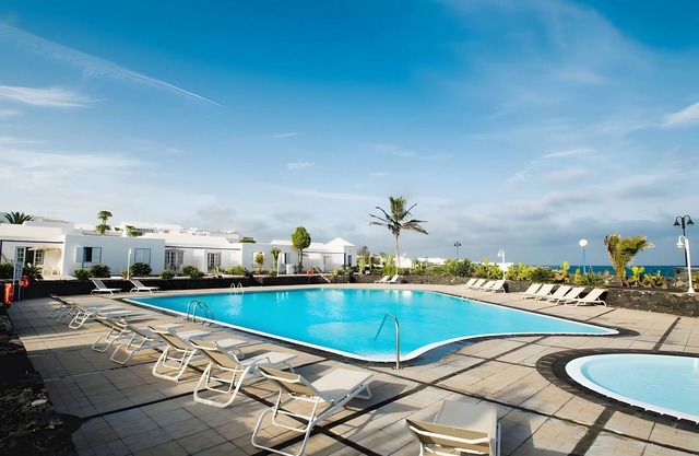 Holiday Home 'Caleta Campos Bungalows' with Sea View, Shared Pool and Wi-Fi