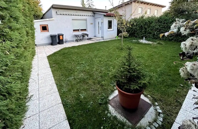 Holiday Home "Cheerful Tiny House" with Private Garden