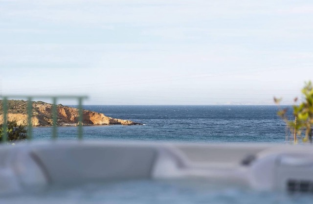 Holiday Home 'Nymph Stone House with Hot Tub' with Sea View, Wi-Fi and Air Conditioning