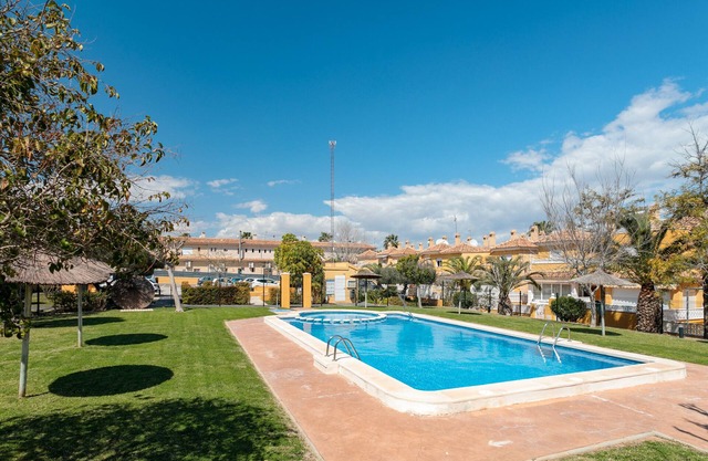 Holiday Home 'Playa Carabassi' with Shared Pool, Private Terrace and Wi-Fi