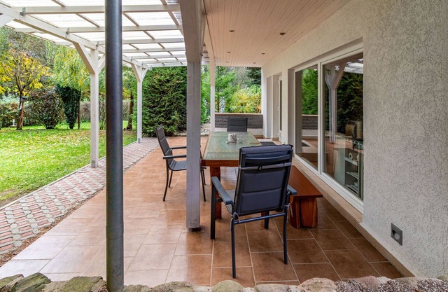 Holiday home with covered terrace and fireplace in Parchim