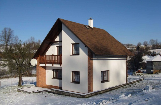 Holiday home with fireplace and hearth