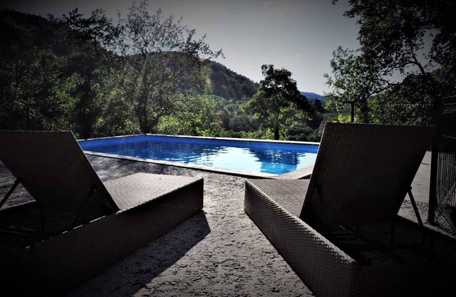 Holiday home with outdoor pool and satellite TV