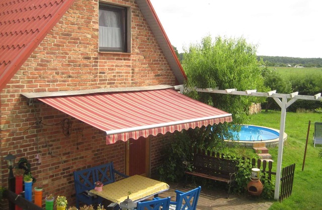 Holiday home with terrace and pool