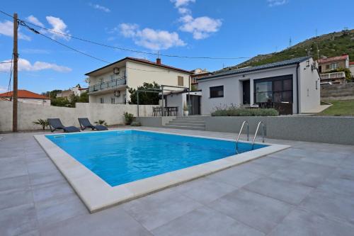 Holiday house with a swimming pool Senj - 21661