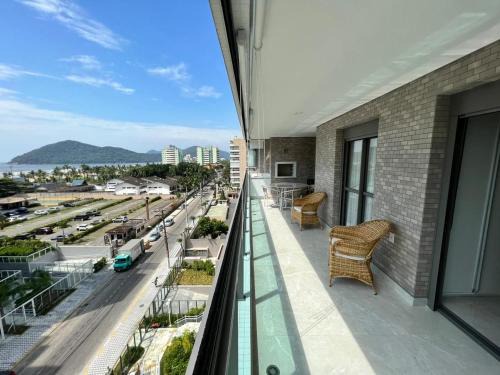 Home 48 I Apto pé na areia e com Piscina Aquecida em Bertioga