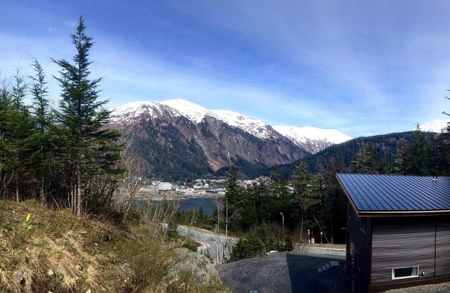 Home with a stunning view, close to trails and town