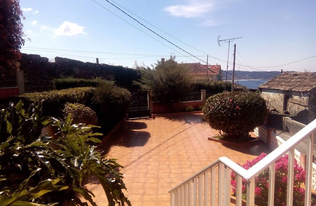 House overlooking the sea: Ria de Aldan, Ons Islands.