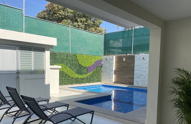 HOUSE TWO STREETS FROM THE MALECON HEATED POOL