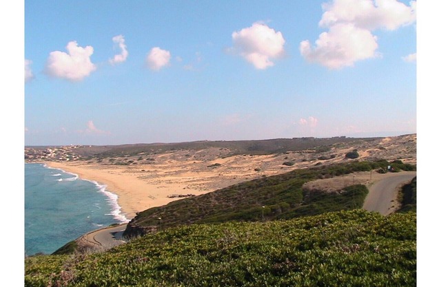 House with garden overlooking the sea