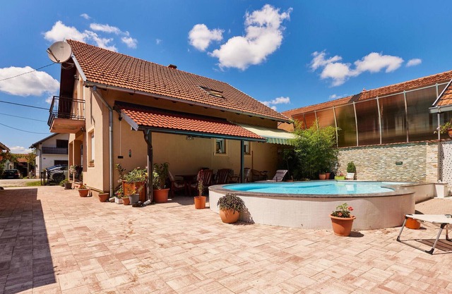 Idyllic, family-friendly vacation home with private outdoor pool and lush garden.