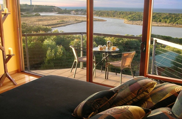 Indulge in a Romantic Spa Apartment with Sweeping Ocean Views