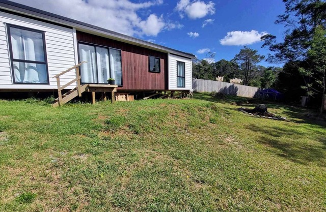Itzy Bitzy house is colourful, cosy, fully fenced with sea views