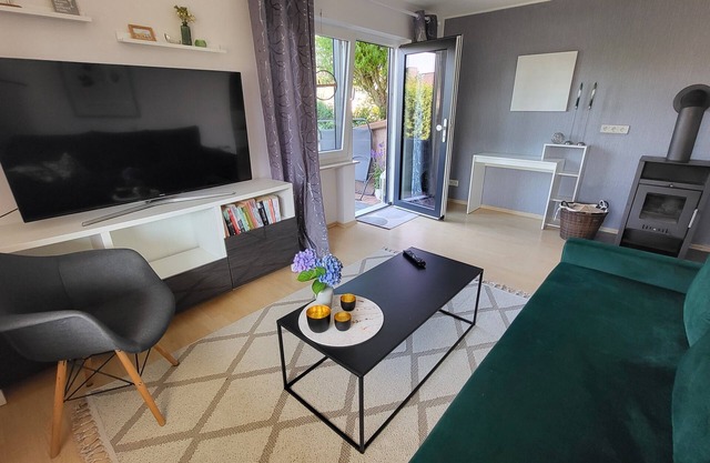 Lahnhöhen close to nature - two-room apartment, fireplace, garden, electric charging station