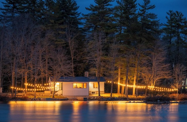 Lakefront home on Moose Pond with expansive views of Pleasant Mountain + hot tub