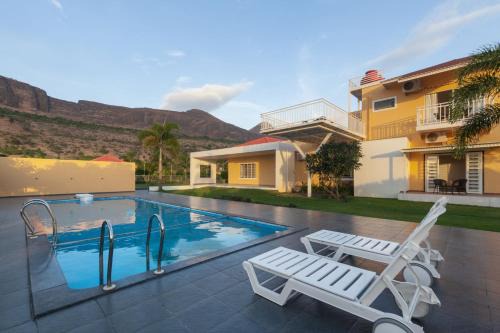 Lakeside Summers by StayVista - Mountain and Waterfalls view, Terrace, Pool & Snooker table for a perfect getaway