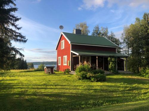 Lapplands lilla Gästhuset med båtuthyrning - Lapplands kleines Gästehaus mit Bootsverleih