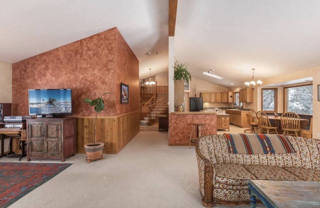 Large custom home with vaulted ceilings, private rural setting, near Whitefish.