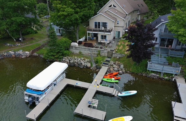 Large home on the UP's best lake! Sleeps 22! Boat to Young's Golf Course!