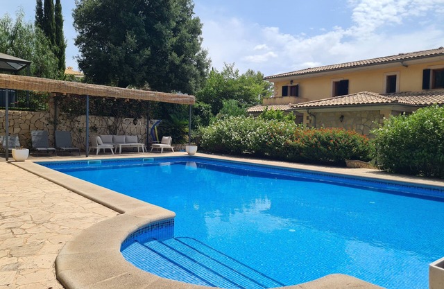 Large villa with pool and jacuzzi in a residential area