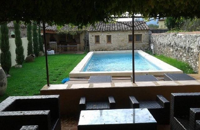 Large village house with swimming pool in the heart of a Provençal village