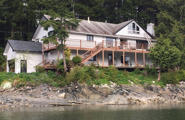 Large waterfront home with private beach- 14 day minimum booking.