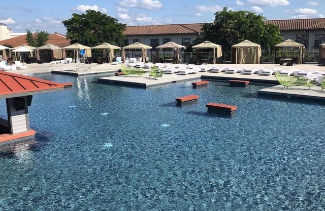 Lazy Waves is a 2BR/2BA condo in exclusive Osage Vistas with a large deck overlooking forest views, gourmet kitchen, 1 king, 1 queen, 1 Murphy bed, and access to the lake's largest seasonal pool. Minutes from shopping, dining, and the Strip.
