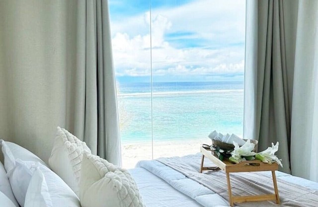 Lazzlla 1BR beachfront oceanview apartment