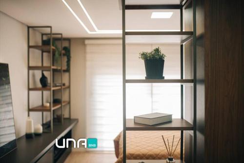 Loft com sacada, lareira e garagem no Parque Una