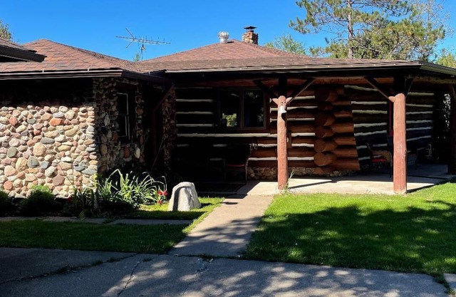 Log Cabin on 40 acres with a private lake