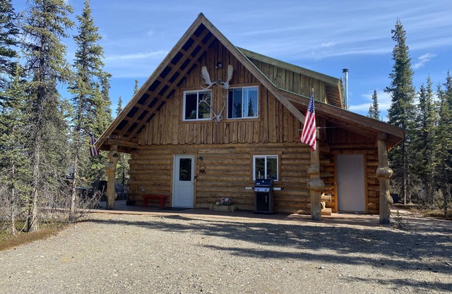 Log House on Denali Airstrip at Mile Post 229.5 of the Parks Highway.