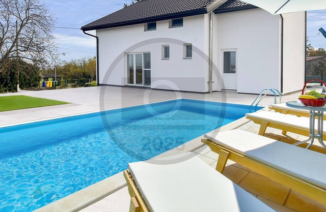 Lovely home in Batina with sauna