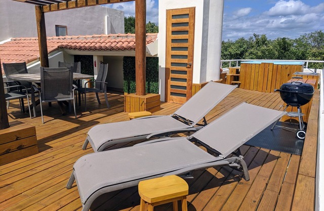 Lujoso Penthouse duplex + rooftop full equipado rodeado de SELVA y MAR