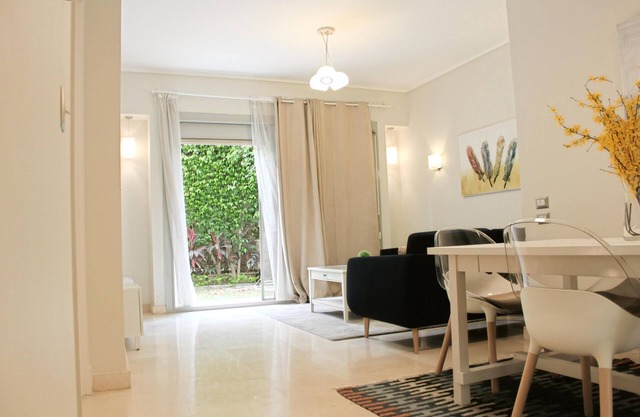 Luxurious 1BR Apartment in Palm Gate New Cairo Near AUC