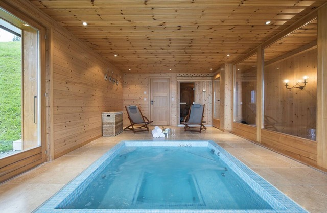 Luxury Swiss Chalet with Outstanding Views, Located 50m from Piste
