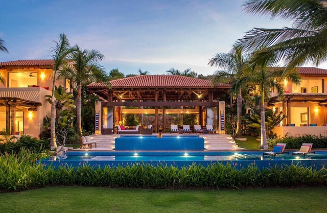 Luxury Three-Acre Estate on Private Beach with Lush Gardens and Staff
