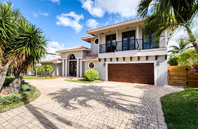 Luxury, waterfront, dog-friendly home with pool, pool spa, & incredible terrace