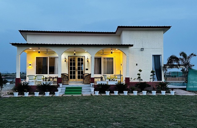 M H Farm A premium Farmhouse 3BHK villa with Pool river view