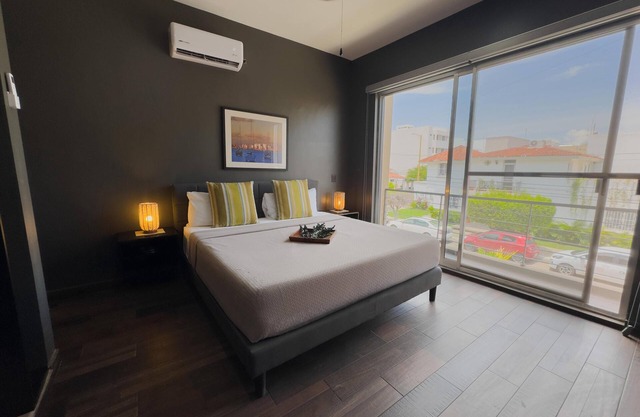 Modern 2‑Bed Condo in Golden Zone: Walk Everywhere!