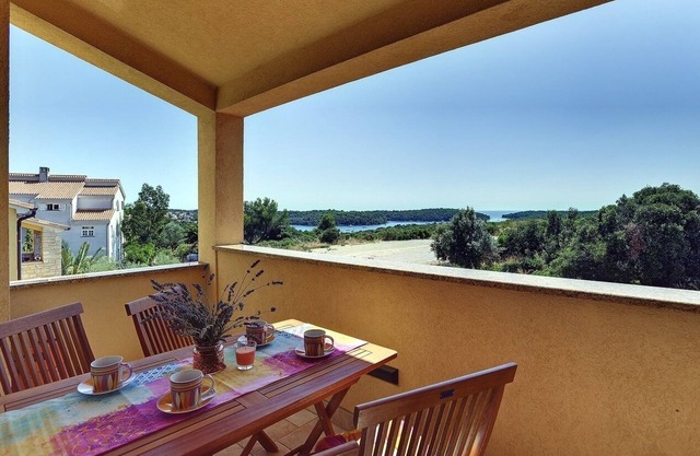 Modern apartment with access to balcony including sea view