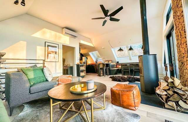 Modern barn perched on 24 acres w/stunning views of mountains & ski resort