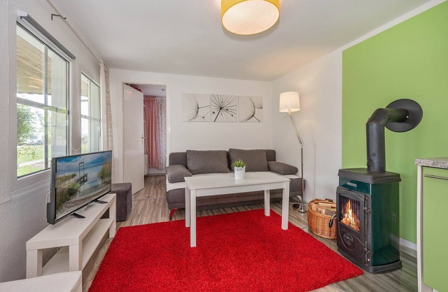 Modern bungalow in Lütow on the Achterwasser with terrace and jetty access