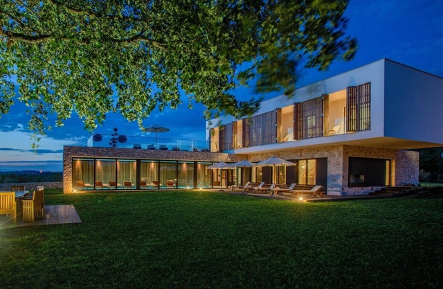Modern-designed villa with indoor-outdoor pool in Istria surrounded by nature on a large property which ensures privacy.