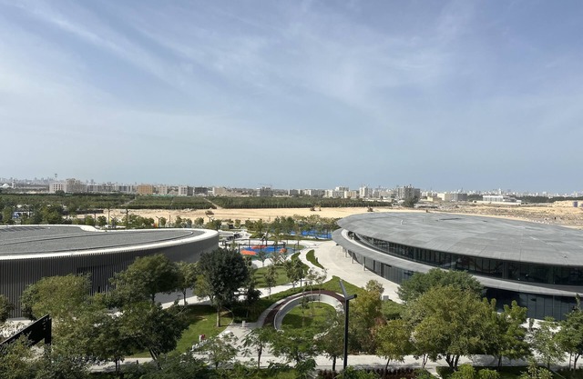 Modern sanctuary with pool and gym access in downtown aljada