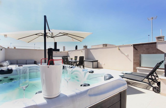 Modern villa with private heated pool, hot tub, large solarium. Split payments